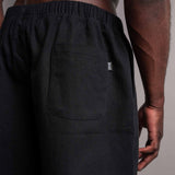 Backpocket von der schwarzen TELLEM Baumwoll Shorts aus Cotton Twill mit gewebten Logo