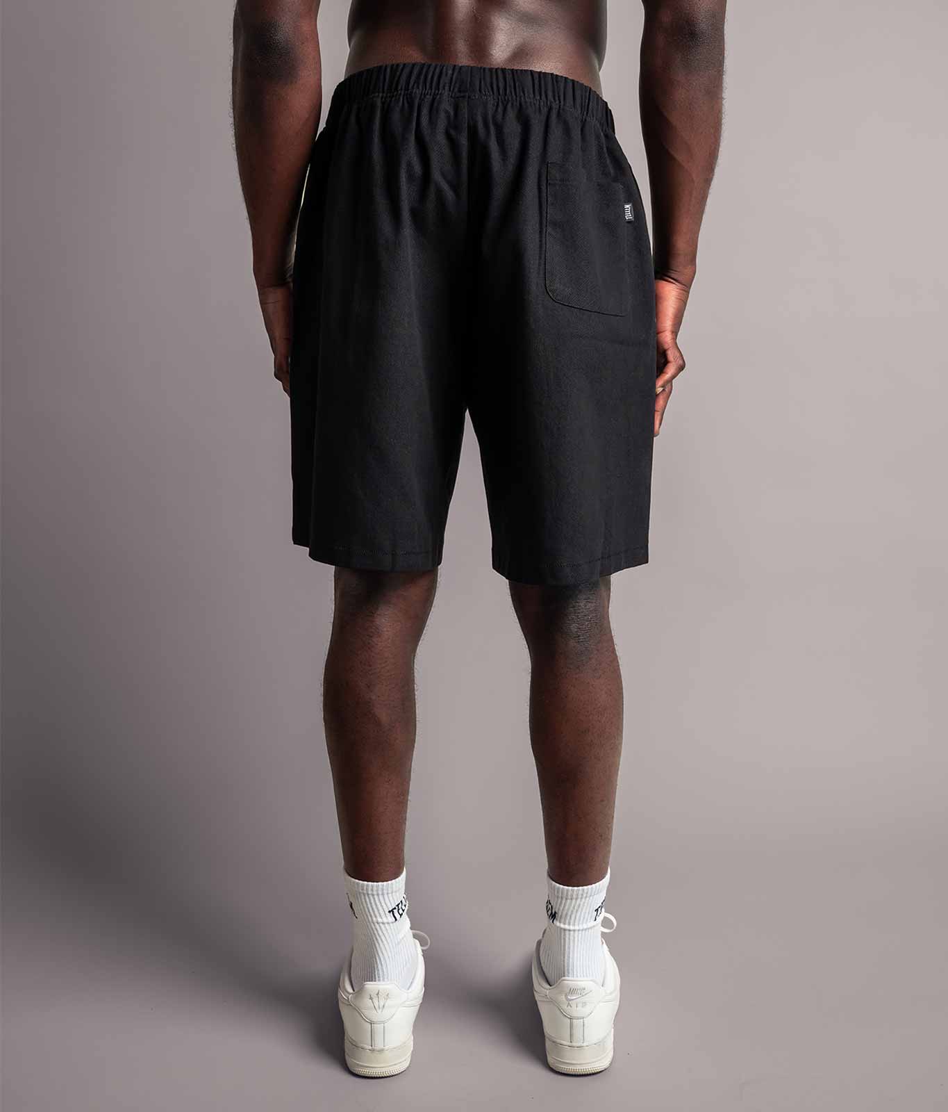 Rückseite von der schwarzen TELLEM Baumwoll Shorts aus Cotton Twill mit Gesäßtasche