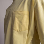 Nahaufnahme Brusttasche am TELLEM Longsleeve Pocket in Lemon Gelb