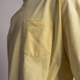 Nahaufnahme Brusttasche am TELLEM Longsleeve Pocket in Lemon Gelb