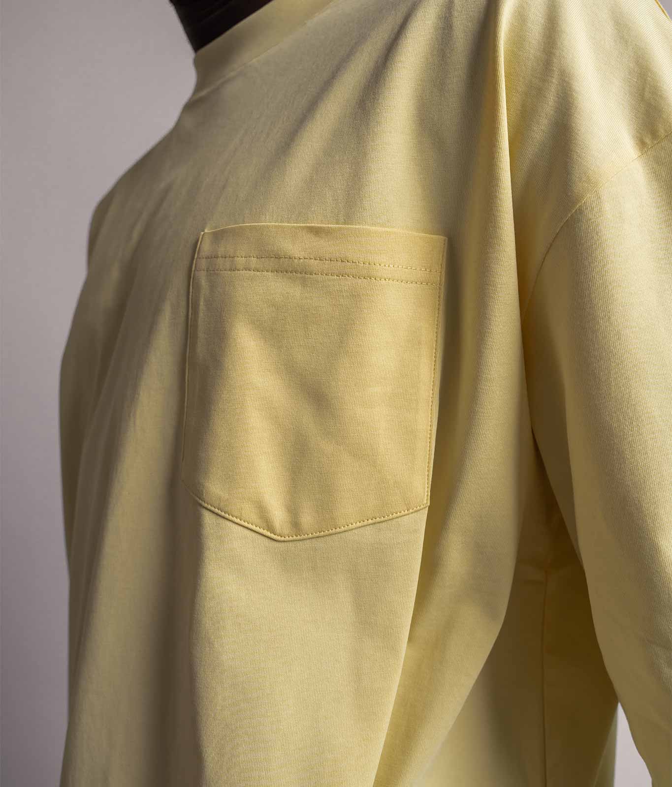 Nahaufnahme Brusttasche am TELLEM Longsleeve Pocket in Lemon Gelb