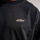 Gesticktes Logo vom schwarzen TELLEM Longsleeve aus 100 % Baumwolle mit lockerem Fit.